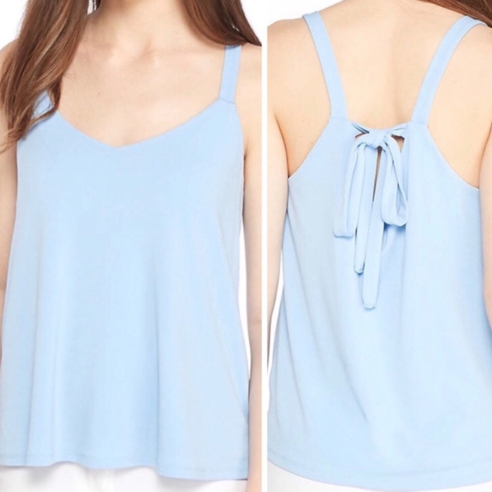 NWT. Kaari Blue baby blue tank with bow back. Size 0x.